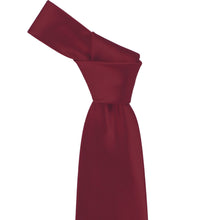 Load image into Gallery viewer, Close-up of a solid burgundy necktie knot, highlighting the rich wine tone and subtle ribbed texture of the fabric.