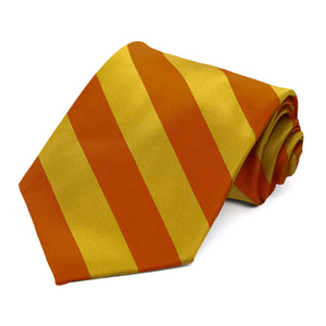 A burnt orange and gold extra long striped tied rolled up