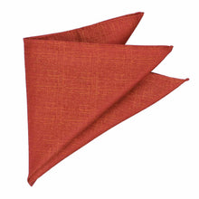 Load image into Gallery viewer, A folded burnt orange pocket square with a textured weave, displayed on a solid white background.