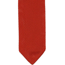 Load image into Gallery viewer, Front of a burnt orange textured knit tie with a pointed tip