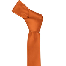 Load image into Gallery viewer, The knot on a burnt orange skinny tie