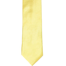 Load image into Gallery viewer, The front of a butter yellow slim tie, laid out flat