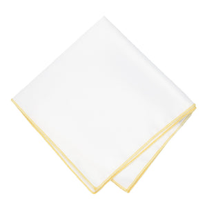 A white pocket square with butter yellow stitching, folded into a diamond