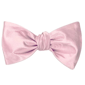 Carnation pink tied self-tie bow tie
