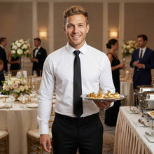 Load image into Gallery viewer, Catering staff in a black tie holding a plate of hors d'oeuvres in a formal event setting