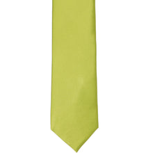 Load image into Gallery viewer, The front of a solid silk tie in chartreuse, laid out flat