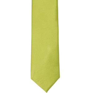 The front of a solid silk tie in chartreuse, laid out flat