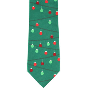 Flat view of a green novelty tie decorated with red and green Christmas ornaments