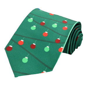 A green novelty tie decorated with red and green Christmas ornaments