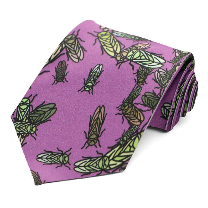 A purple tie with a crawling green and brown cicada pattern 