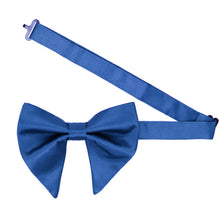 Load image into Gallery viewer, An oversized cobalt blue bow tie with an open band collar