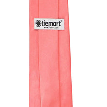 Load image into Gallery viewer, Coral tie with a 'tiemart' label on a white background