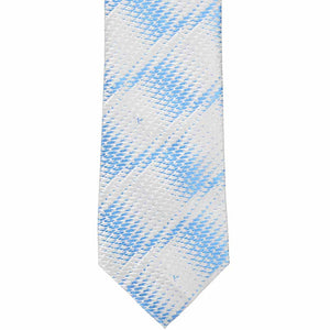 The front of a cornflower and silver geometric tie, laid flat