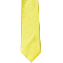 Load image into Gallery viewer, The front of a daffodil yellow slim tie, laid out flat