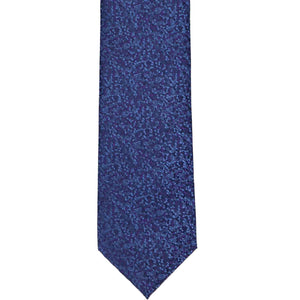 The front of a dark blue and purple pebble pattern tie