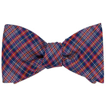 Load image into Gallery viewer, Tied dark blue, red and blue plaid pattern self-tie bow tie