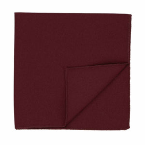 A folded dark burgundy matte pocket square, flipped up to show the backside