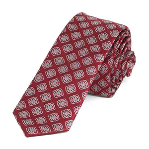 A dark crimson tie with a medallion pattern