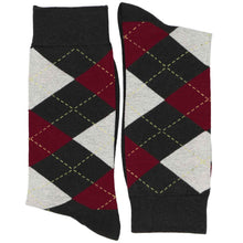 Load image into Gallery viewer, A folded pair of dark gray and burgundy argyle socks