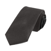 Load image into Gallery viewer, A dark gray velvet tie, rolled to show off the front