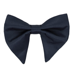 A dark navy blue bow tie in an oversized teardrop style