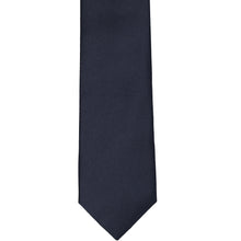 Load image into Gallery viewer, The front of a dark navy blue slim tie, laid flat