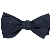 Load image into Gallery viewer, A solid color dark navy blue self-tie bow tie, tied