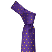 Load image into Gallery viewer, The knot on a dark purple and gold polka dotted necktie