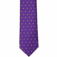Load image into Gallery viewer, The front of a dark purple and gold polka dot necktie