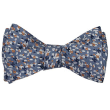 Load image into Gallery viewer, A dusty blue and antique gold grain pattern bow tie, tied