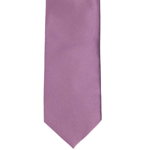 The front of a dusty purple tie, laid flat