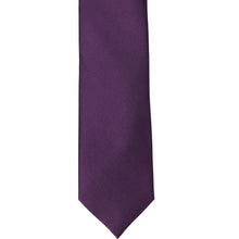 Load image into Gallery viewer, The front of an eggplant purple slim tie, laid out flat