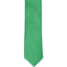 Load image into Gallery viewer, The front of an emerald green skinny tie, laid flat