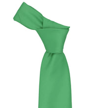 Load image into Gallery viewer, Knotted green tie on a white background