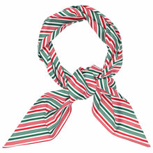 Load image into Gallery viewer, A holiday striped scarf with red, green, and white diagonal bands, styled in a loop with a large knot and two long tails, shown on a solid white background.