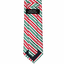 Load image into Gallery viewer, A Christmas-themed necktie featuring diagonal red, green, and white stripes, with a black fabric tag.