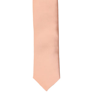 The front of a flamingo skinny tie, laid flat
