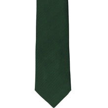 Load image into Gallery viewer, The front of a forest green herringbone slim tie, laid out flat
