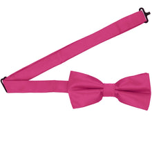Load image into Gallery viewer, Fuchsia pre-tied bow tie with the band open