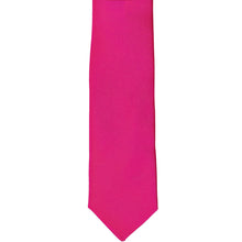 Load image into Gallery viewer, The front of a fuchsia skinny tie, laid flat