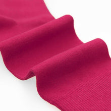 Load image into Gallery viewer, Close-up of a fuchsia sock texture on a white background