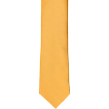 Load image into Gallery viewer, The front of a gold bar skinny tie, laid flat
