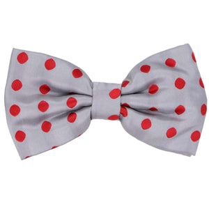 A gray pre-tied bow tie with fun red polka dots in a medium size