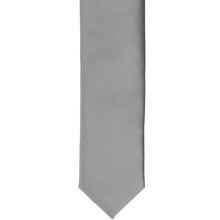Load image into Gallery viewer, The front of a gray skinny tie, laid flat