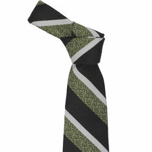 Load image into Gallery viewer, Black and green striped tie, knotted, with white accents on a white background