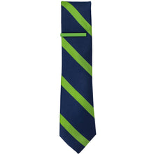 Load image into Gallery viewer, A solid green tie bar on a grass green and navy striped tie