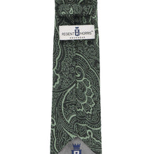 Load image into Gallery viewer, A close-up of a necktie with a green paisley pattern, featuring a white Regent Morris Neckwear label at the collar and a gray tip with a blue crest.