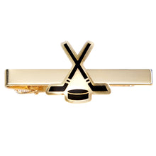 Load image into Gallery viewer, Gold tie clip with hockey stick and puck design on a white background