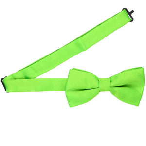 A hot lime green bow tie with the band collar open