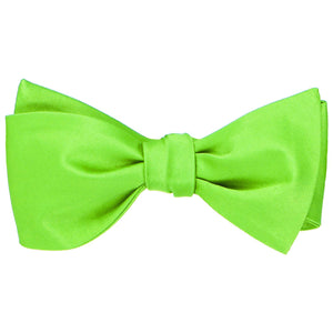 A hot lime green self-tie bow tie, tied